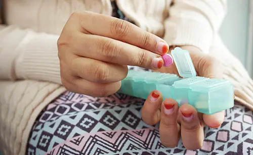 Woman Taking Medication