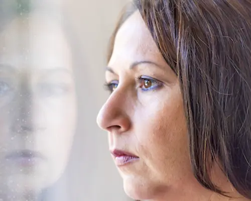 Woman Looking at Reflection